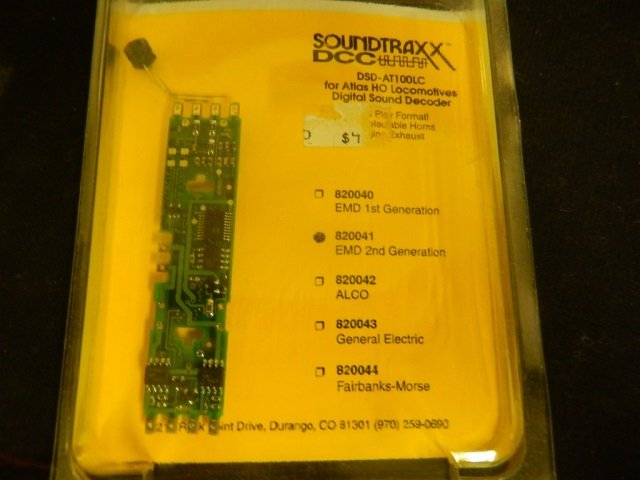 SOUNDTRAXX DIGITAL SOUND DECODER: FOR ATLAS HO LOCOMOTIVES. MODEL DSD-AT100LC. 820041, EMD 2ND GENERATION. PLUG AND PLAY FORMAT, THREE SELECTABLE HORNS, BELL, ENGINE EHXHAUST. NEW IN PACKAGE