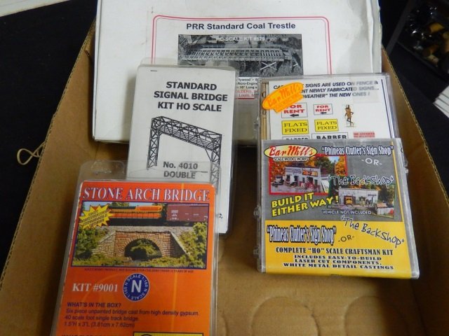 4 NEW STRUCTURE MODELS: LOT INCLUDES N SCALE MONROE MODEL STONE ARCH BRIDGE, ONE HO SCALE PHIONEAS CLUTTER'S SIGN SHOP FROM BAR MILLS, ONE HO SCALE STANDARD SIGNAL BRIDGE FROM N.J. INTERNATIONAL AND ONE HO SCALE PRR STANDARD
