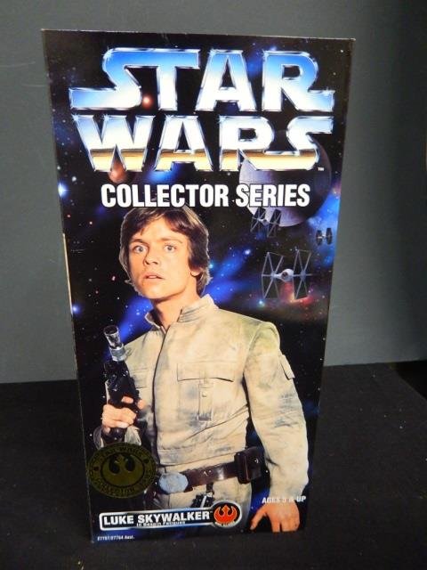 2 STAR WARS ACTION FIGURES: NEW IN BOX. LOT INCLUDES: LUKE SKYWALKER IN BESPIN FATIGUES AND OBI-WAN KENOBI IN HOOD AND BOOTS BOTH 12" TALL AND COLLECTOR SERIES. FULLY POSEABLE FIGURE.