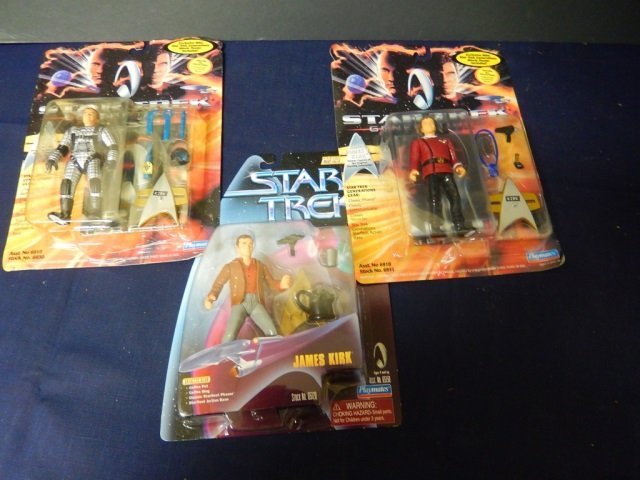 3 STAR TREK "JAMES KIRK" ACTION FIGURE: ALL NEW IN BOX. ALL 5" TALL. LOT INCLUDES CAPTAIN IN SPACE SUIT WITH GEAR, GALACTIC GEAR, AND CLASSIC CAPTAIN KIRK.