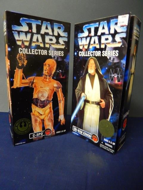2 STAR WARS ACTION FIGURES: NEW IN BOX. LOT INCLUDES: C-3PO 12" TALL AND OBI-WAN KENOBI COMES OUTFITTED IN HIS HOODED ROBE, SHIRT, PANTS, INNER ROBE AND BOOTS. 12" TALL BOTH A COLLECTOR SERIES FROM KENNER