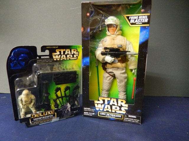 2 STAR WARS COLLECTABLES: NEW IN BOX. LOT INCLUDES: LUKE SKYWALKER IN HOTH GEAR WITH A FIRING REBEL BLASTER 12" TALL AND SNOWTROOPER WITH E-WEB HEAVY REPEATING BLASTER 3" TALL FIGURINE. KENNER 1996