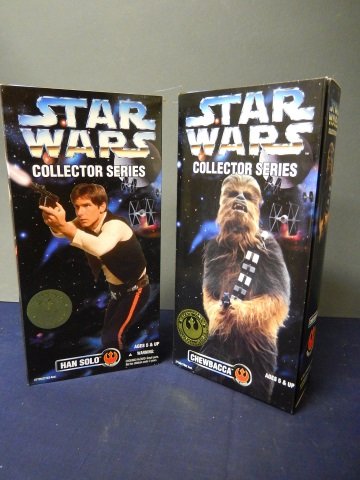 2 STAR WARS ACTION FIGURES: NEW IN BOX. LOT INCLUDES: HAN SOLO WITH HIS TWO BLASTERS AND CHEWBACCA WITH HIS BOWCASTER, TOGETHER AGAIN. BOTH 12" TALL AND POSEABLE.