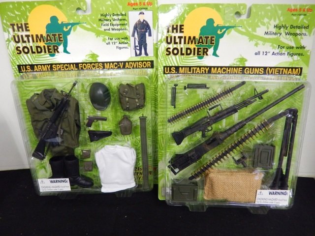 ULTIMATE SOLIDER UNIFORM AND WEAPONS: MINT IN PACKAGE. LOT INCLUDES ONE U.S. ARMY SPECIAL FORCES MAC-V AND ONE U.S. MILITARY MACHINE GUNS (VIETNAM)