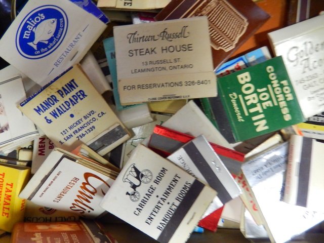 VINTAGE MATCHBOOKS: BOX LOT INCLUDES SEVERAL DOZEN VINTAGE MATCHBOOKS FROM LAS VEGAS,FOREIGN LOCATIONS, VARIOUS HOTELS, PRINCESS DI & CHARLES, FORD MOTORS AND YEARS
