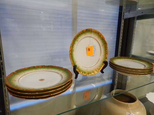 VINTAGE LIMOGES T&V PLATE SET: LOT INCLUDES 9 PLATES. EACH IS APPROX 9.5" ROUND AND STAMPED "T & V FRANCE NEW YORK LIMOGE HIGGINS AND SEITER" ON BACK. 3 PLATES HAVE CHIPS. DETAILS IN PHOTOS