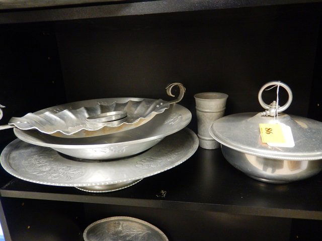 ALUMINUM SERVING PIECES: LOT INCLUDES 6 ITEMS: 4 COASTERS, 1 SERVING TRAY 13" OVAL, 1 BOWL 14" ROUND, 1 CAKE STAND 15.5" ROUND, 1 CUP 5.5", 1 GRAVY BOWL WITH TOP10" ROUND.