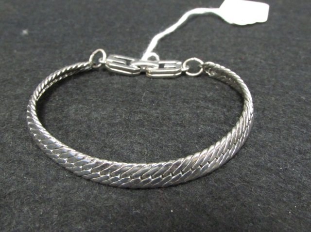 SILVER TONE BRACELET MARKED GIVENCHY: SILVER TONE BRACELET MARKED GIVENCHY
