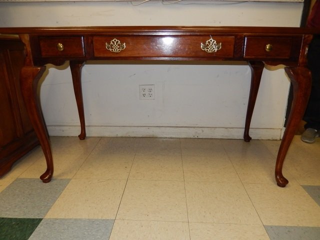 LADIES WRITING DESK WITH QUEEN ANN LEGS: ONE CENTER DRAWER AND 2 SMALL SIDE DRAWERS 27" WIDE X 55" LONG X 31" HIGH LIKE NEW CONDITION