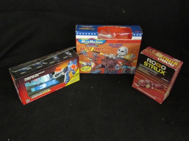 VARIETY VINTAGE TOYS (3): ORGINAL PACKAGING MICRO MACHINES SKULL CANYON TANSFORMERS AUTOBOT COURIER BLURR ROBO STRUX- MOTORIZED ROBOT