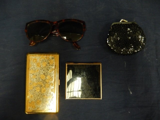 4 WOMEN'S VINTAGE ITEMS CIGARETTE CASE. TRAVELING CLOCK: CIGARETTE CASE. TRAVELING CLOCK AND CALCULATOR, BLACK COIN PURSE, & MARILYN MONROE SUNGLASSES