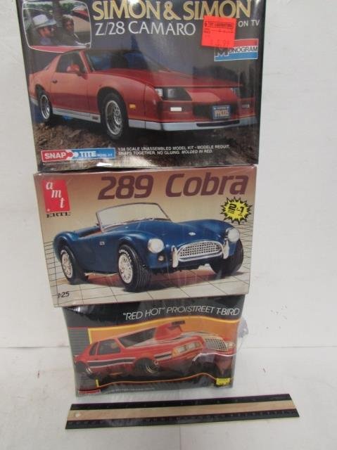 3 PLASTIC CAR MODEL KITS: ALL ARE IN ORIGINAL PACKAGING, "RED HOT" PRO/STREET T-BIRD, 289 COBRA, SIMON & SIMON Z-28 CAMARO MODEL KITS