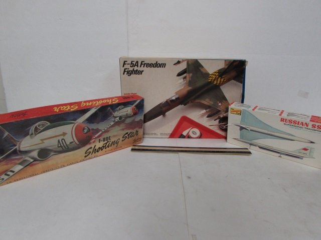3 PLASTIC AIRCRAFT MODEL KITS: RUSSIAN SST SUPERSONIC TRANSPORT, F-80C SHOOTING STAR, & F-5A FREEDOM FIGHTER MODEL KITS