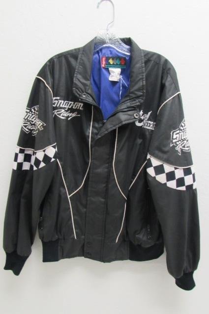 SNAP-ON BLACK & WHITE RACING JACKET JACKET IS BLACK AND: JACKET IS BLACK AND WHITE PIPING LOGO, EACH SLEEVE HAS SNAP-ON RACING LOGO & CHECKERED FLAG, SIZE LARGE