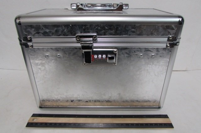 SILVER SAFE CARRIER CASE HAS A COMBINATION LOCK, MIRROR: HAS A COMBINATION LOCK, MIRROR INSIDE, & 2 PULL OUT DRAWERS