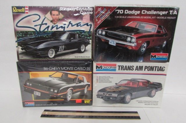 4 PLASTIC CAR MODEL KITS ALL ARE IN ORIGINAL PACKAGING,: ALL ARE IN ORIGINAL PACKAGING, 86 CHEVY MONTE CARLO SS, TRANS AM PONTIAC, STINGRAY CORVETTE COUPE, 70 DODGE CHALLENGER T/A