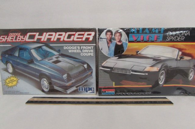 2 VINTAGE CAR MODEL KITS BOTH ARE IN ORIGINAL: BOTH ARE IN ORIGINAL PACKAGING, MIAMI VICE DAYTONA SPYDER, & DODGE SHELBY CHARGER