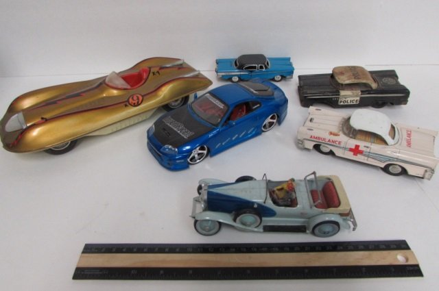 6 VINTAGE TOY CARS VINTAGE POLICE CAR, AMULANCE, EDSEL,: VINTAGE POLICE CAR, AMULANCE, EDSEL, IMPORT RACER, & A SIGNED SIREN STAN VEHICLE