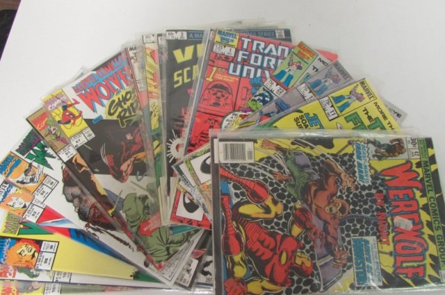 ASSORTED VINTAGE MARVEL COMIC BOOKS WEREWOLF,: WEREWOLF, TRANSFORMERS, VISION AND THE SCARLET WITCH, WOLVERINE AND MORE