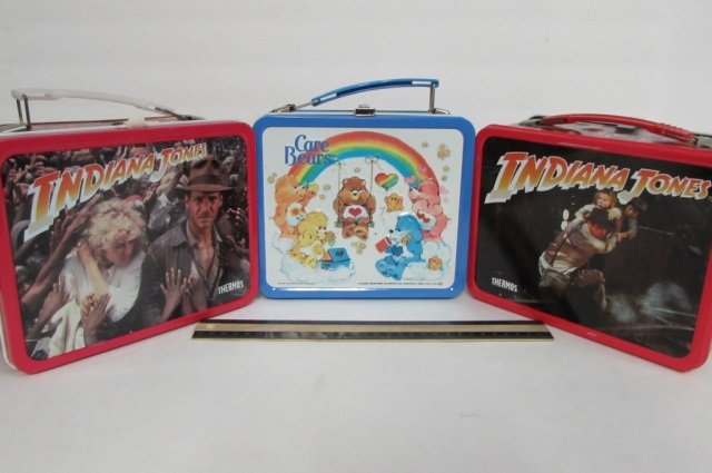 3 VINTAGE STEEL LUNCH BOXES (2) 1984 INDIANA JONES: (2) 1984 INDIANA JONES (BOTH INCLUDE THERMOS) & CARE BEARS (THERMOS INCLUDED)