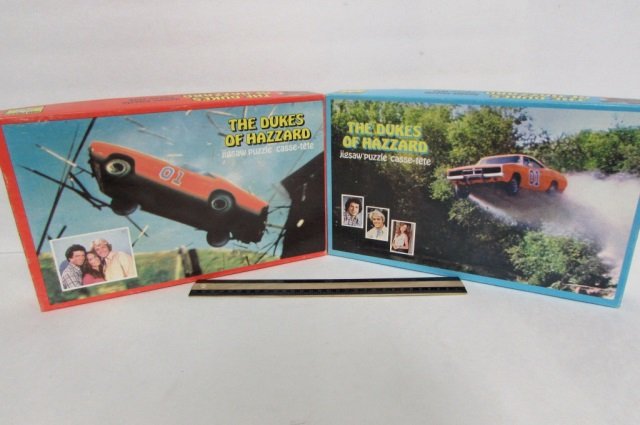 2 VINTAGE DUKES OF HAZZARD PUZZLES (1981) 2 DUKES OF: 2 DUKES OF HAZZARD PUZZLES IN ORIGINAL BOXES (1981) WITH 200 PIECES EACH.
