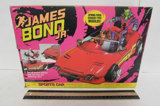 JAMES BOND JR SPORTS CAR IN ORIGINAL PACKAGING, SPRING: IN ORIGINAL PACKAGING, SPRING FIRED EXHAUST PIPE MISSLE