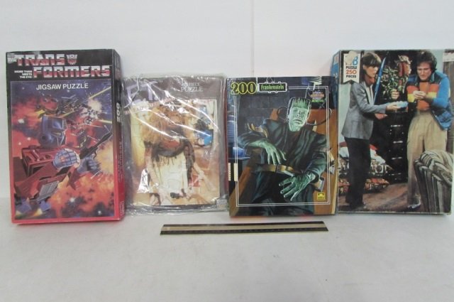 ASSORTED VINTAGE JIGSAW PUZZLES MORK & MINDY,: MORK & MINDY, TRANSFORMERS, FRANKENSTIEN, & MORE