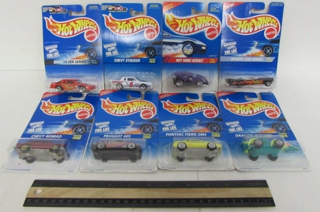8 HOT WHEELS COLLECTIBLE CARS ALL ARE IN ORIGINAL: ALL ARE IN ORIGINAL PACKAGING, PEUGEOT 405, CHEVY NOMAD, PONTIAC FIERO 2M4, (2) DRAGON WAGON, QUICKSILVER SERIES, CHEVY STOCKER, SPORTS CAR SERIES, HOT HUBS SERIES,