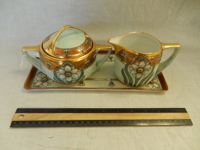 PORCELAIN ART DECO CREAM & SUGAR SET: PORCELAIN ART DECO CREAM & SUGAR SET HANDPAINTED ART DECO STYLE, INCLUDES TRAY, 11 1/2" LONG, IN GREAT CONDITION