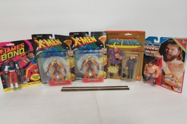 ASSORTED VINTAGE ACTION FIGURES (5) ALL ARE IN ORIGINAL: ALL ARE IN ORIGINAL PACKAGING, 1990 WWF WRESTLER, (2) X-MEN SABRETOOTH FIGURE, 1989 DC COMICS SUPER HEROES, & JAMES BOND JR FIGURES