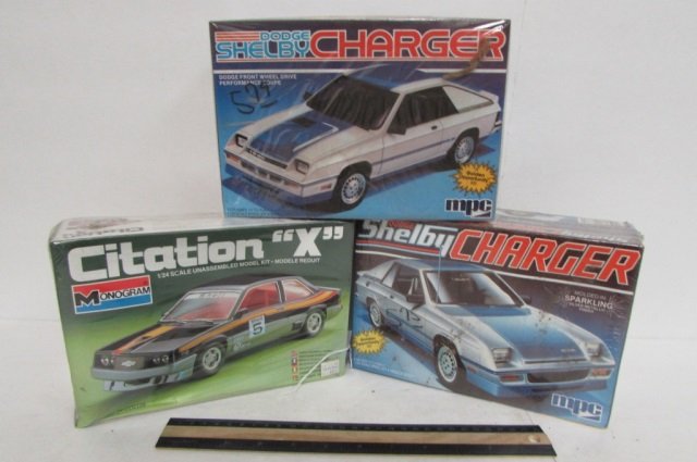 3 VINTAGE PLASTIC CAR MODEL KITS ALL ARE IN ORIGINAL: ALL ARE IN ORIGINAL PACKAGING, CITATION "X", & (2) SHELBY DODGE CHARGERS