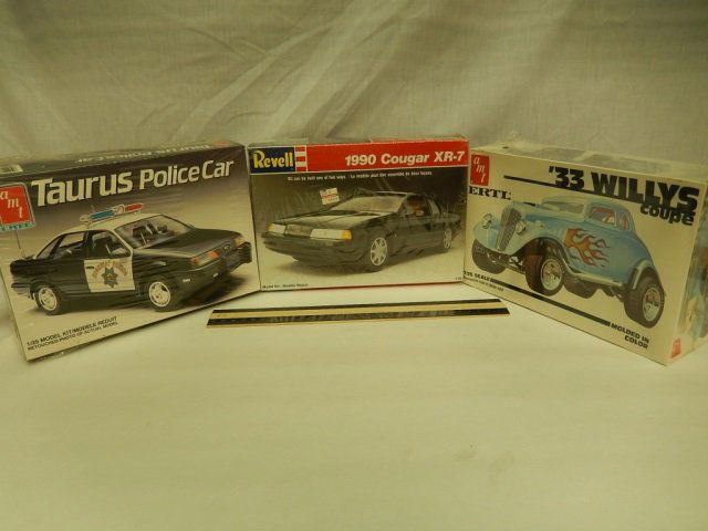 3 VINTAGE PLASTIC CAR MODEL KITS ALL ARE IN ORIGINAL: ALL ARE IN ORIGINAL PACKAGING, TAURUS POLICE CAR, 33 WILLYS COUPE, & 1990 COUGAR XR-7
