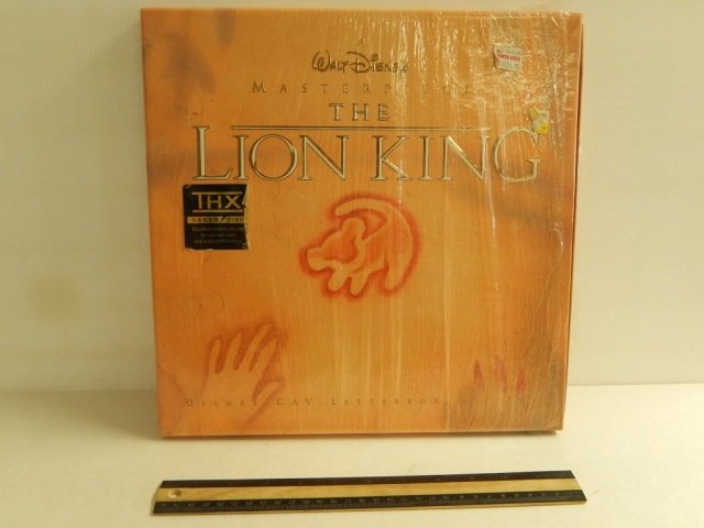 WALT DISNEY'S LION KING LASER DISC SET DELUXE CAV: DELUXE CAV LETTERBOX EDITION INCLUDES 4 LASER DISC SET, PORTFOLIO CONCEPT ART LITHOGRAPHS, SUPPLEMENTAL MATERIAL JACKET (EMPTY) MOVIE SOUND TRACK JACKET (EMPTY)