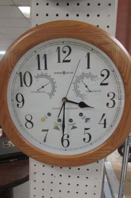 HOWARD MILLER WEATHER FORCASTER WALL CLOCK COMBO OAK: OAK FRAME CLOCK, BATTERY OPERATED