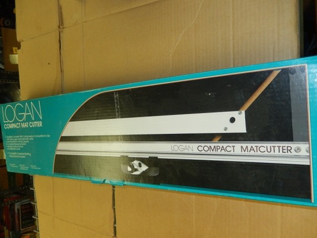 LOGAN COMPACT MAT CUTTER IN ORIGINAL PACKAGING: IN ORIGINAL PACKAGING