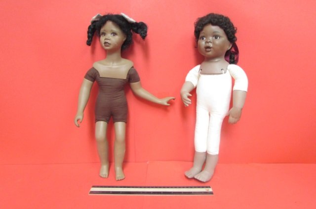 BISQUE BLACK AMERICANA DOLLS (2) TALLEST ONE BEING 17": TALLEST ONE BEING 17" TALL, BROWN GLASS EYES, BROWN HAIR, NO CLOTHING INCLUDED,ONE NOT MARKED, THE TODDLER DOLL IS MARKED GRACE FROM THE HEARTS AND SONG COLLECTION 1992 MARKED GS 3484