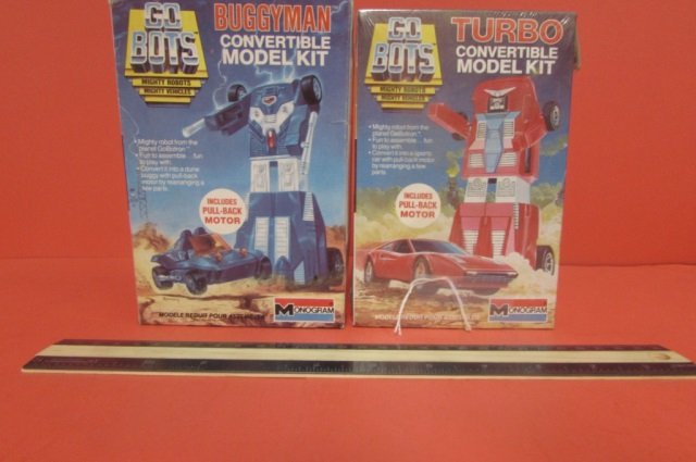 1984 GO BOTS CONVERTIBLE MODEL KITS (2) TURBO MODEL KIT: TURBO MODEL KIT IS IN ORIGINAL PACKAGING, BUGGY MODEL KIT ORIGINAL PACKAGING HAS BEEN OPENED, INCLUDES PULL BACK MOTOR