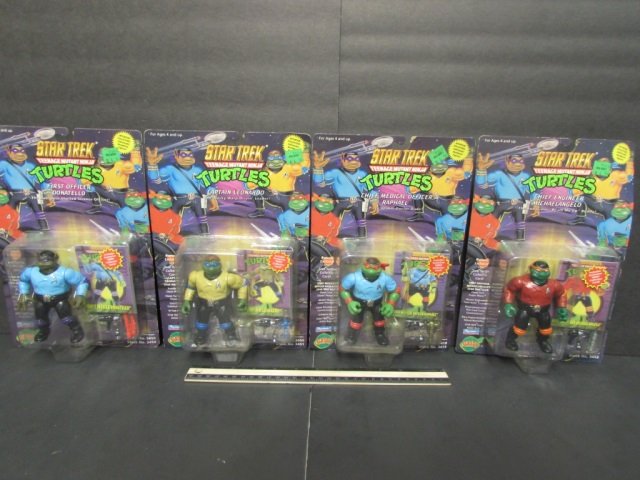 1994 STAR TREK TEENAGE MUTANT NINJA TURTLES (4) ALL ARE: ALL ARE IN ORIGINAL PACKAGING, CHIEF ENGINEER MICHAELANGELO, CHIEF MEDICAL OFFICER RAPHAEL, CAPTAN LEONARDO, & FIRST OFFICERR DONATELLO FIGURES