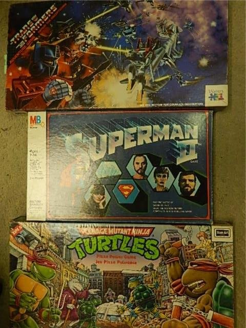 VINTAGE BOARD GAMES (3) IN ORIGINAL PACKAGING, TEENAGE: IN ORIGINAL PACKAGING, TEENAGE MUTANT NINJA TURTLES, TRANSFORMERS, & SUPERMAN