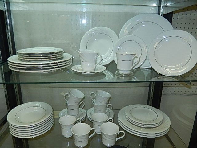 GIBSON CHINA SET EVERY DAY DISHWARE. FOUR PIECE PLACE: EVERY DAY DISHWARE. FOUR PIECE PLACE SETTING FOR EIGHT. WHITE WITH GOLD BAND.