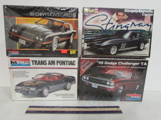 4 VINTAGE PLASTIC CAR MODEL KITS ALL ARE IN ORIGINAL: ALL ARE IN ORIGINAL PACKAGING, STINGRAY CORVETTE COUPE, 86 CHEVY MONTE CARLO SS, TRANS AM PONTIAC, & 70 DODGE CHALLENGER