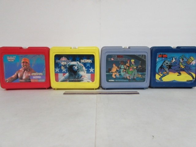 4 VINTAGE PLASTIC LUNCH BOXES 1982 BATMAN INCLUDES: 1982 BATMAN INCLUDES THERMOS, 1986 ASTRONAUTS INCLUDES THERMOS, 1989 WWF INCLUDES THERMOS, & 1984 THE REAL GHOSTBUSTERS DOES NOT INCLUDE A THERMOS