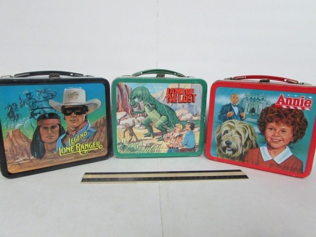 3 VINTAGE STEEL LUNCH BOXES 1981 ANNIE, 1975 LAND OF: 1981 ANNIE, 1975 LAND OF THE LOST, & 1980 THE LEGEND OF THE LONE RANGER