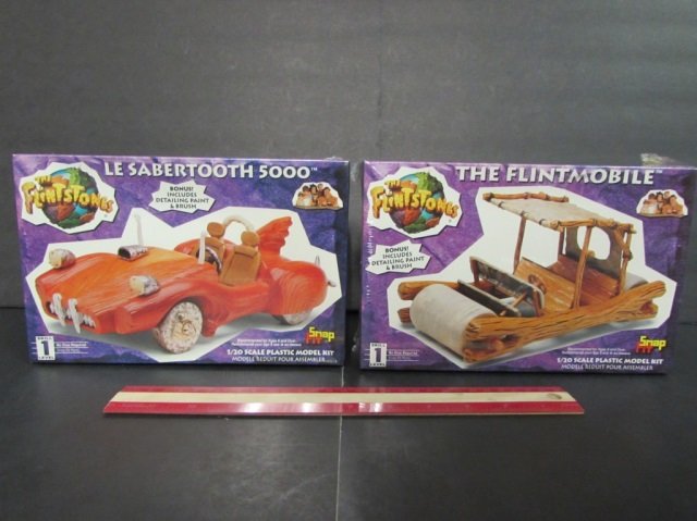 THE FLINSTONES PLASTIC MODEL KITS (2) BOTH ARE IN: BOTH ARE IN ORIGINAL PACKAGING, THE FLINTMOBILE, & LE SABERTOOTH 5000