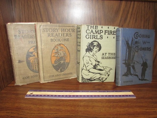 VINTAGE BOOKS CIRCA LATE 1800S TO EARLY 1900S (4): TITLES INCLUDE THE CAMP FIRE GIRLS AT THE SEASHORE (1914), STORY HOUR READERS REVISED: PRIMER (1913/1923), STORY HOUR READERS: BOOK ONE (1913) & COONING WITH COONERS (1924)