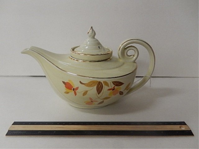 HALL'S AUTUMN LEAVES TEAPOT: THREE PIECE TEAPOT WITH TEA BASKET INSERT AND REPAIRED LID. 11 INCHES WIDE