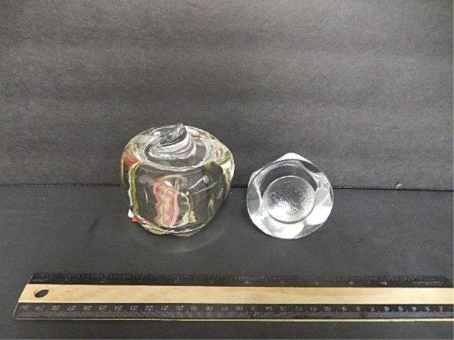 TIFFANY CRYSTAL APPLE AND PAPERWEIGHT: TIFFANY SIGNED CRYSTAL APPLE JAR AND INTAGLIO COIN WOMAN CARVING PAPERWEIGHT. APPLE JAR IS 4 INCHES TALL AND THE PAPERWEIGHT IS 2 3/4 INCHES TALL.