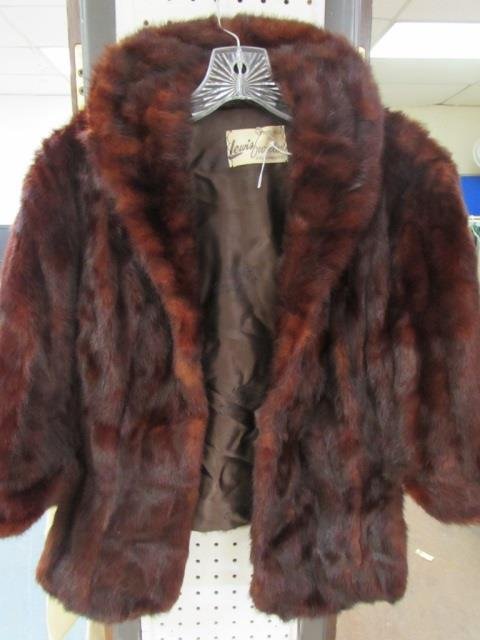 LEWIS FURRIER SACRAMENTO FUR CAPE: BEAUTIFUL FUR CAPE, COVERS SHOULDERS AND HAS HAND POCKETS. EXCELLENT CONDITION.