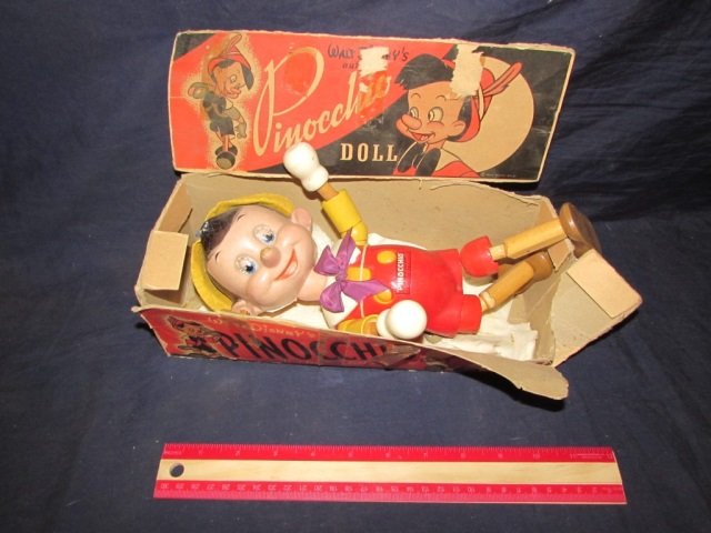 VINTAGE WALT DISNEY PINOCCHIO WOOD PUPPET DOLL AND BOX: DOLL AND BOX SHOW SOME WEAR, JOINTED ARMS AND LEGS, THE NOSE & HEAD SHOWS WEAR