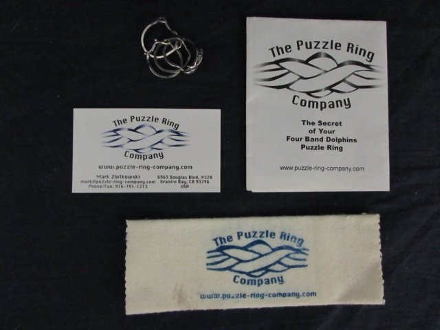 VINTAGE PUZZLE RING FOUR BAND DOLPHIN PUZZLE RING,: FOUR BAND DOLPHIN PUZZLE RING, INSTRUCTION MANUAL INCLUDED